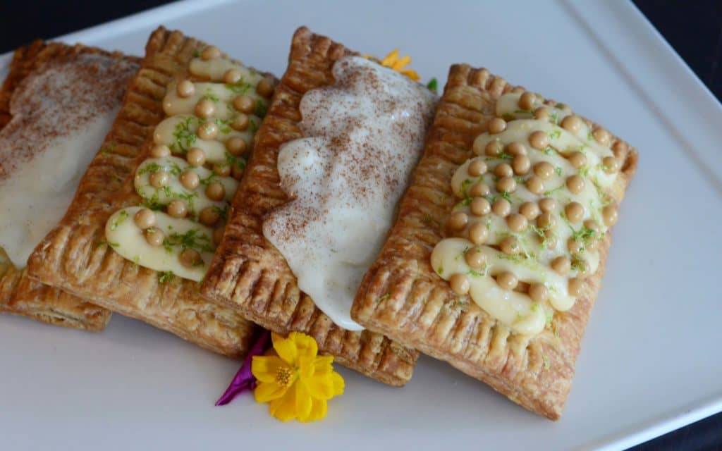 Four house made Pop-tarts served on square plate